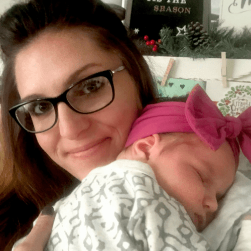 Kate, a mother holding her baby